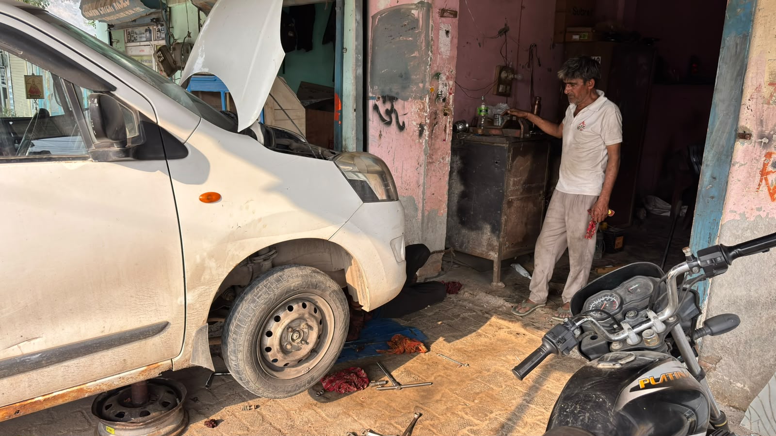 Car repair activity going on at the Mistri Car Mechanic workshop